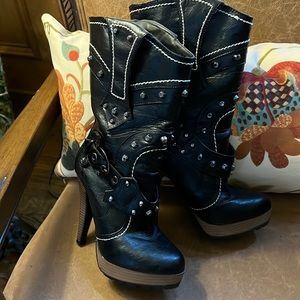 Revenge brand studded platform boots. Mid to lower calf depending on leg length